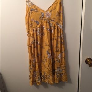 Yellow sundress with floral pattern